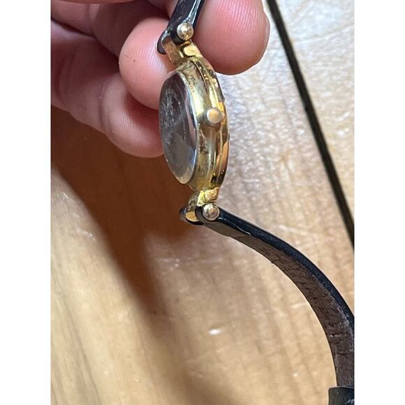 Women's GITANO Gold Tone Abalone Shell Dial Watch, Black Band. Roman numerals - Picture 7 of 9